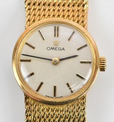 Lot 592 - OMEGA; a lady's 9ct gold cased wristwatch, the...