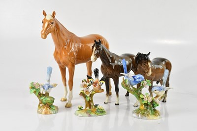 Lot 2483 - BESWICK; three horses including a Palomino...