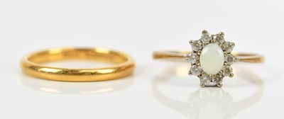 Lot 381 - A 22ct yellow gold wedding band, size K,...
