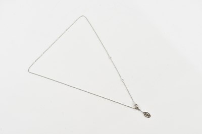 Lot 230 - CARTIER; an 18ct white gold link chain...