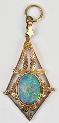 Lot 271 - A yellow metal pendant set with a white fire...