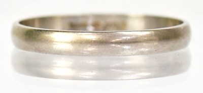Lot 1256 - A platinum wedding band, maker B. Bros,...