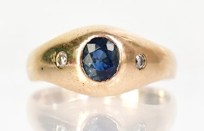Lot 1312 - A 14ct yellow gold ring set with a blue oval...