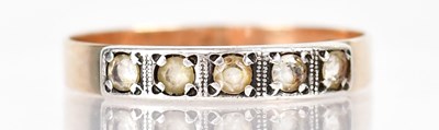 Lot 1310 - A 14ct yellow gold ring set with five white...