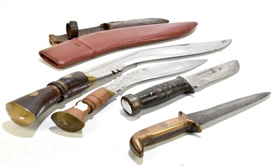 Lot 322 - A collection of four knives to include two...