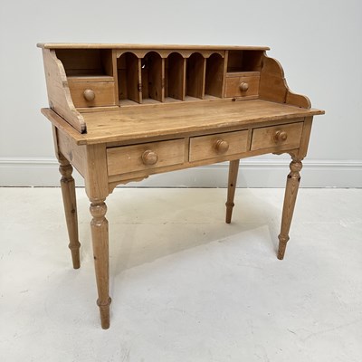 Lot 1232 - A Victorian style pine writing table, on...