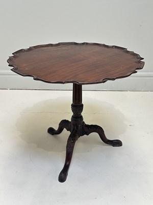 Lot 1175 - A 19th century mahogany tripod table with...
