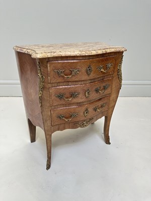 Lot 1104 - A reproduction French kingwood three drawer...