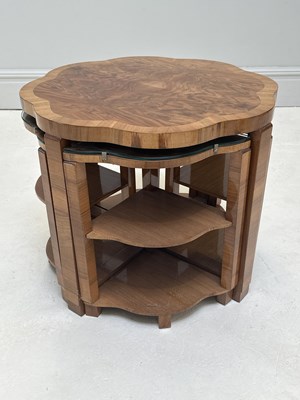 Lot 1026 - An Art Deco walnut nest of tables, height 52cm,...