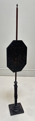 Lot 1273 - A 19th century mahogany pole screen with...