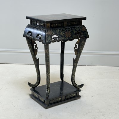 Lot 1194 - A Chinese black lacquer and gilt decorated...