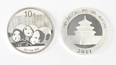 Lot 1193 - Two China 10 Yuan Panda .999 silver 1oz coins,...