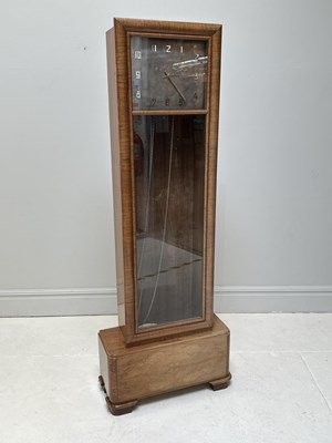 Lot 1316 - An Art Deco thirty hour walnut longcase clock,...