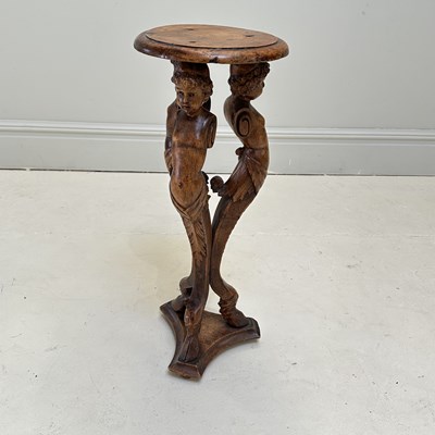 Lot 1220 - A Continental carved walnut jardinière stand,...