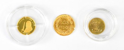 Lot 1181 - An American Mint 'World's Smallest Gold Coins'...