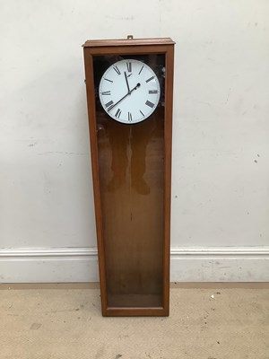Lot 1334 - A mahogany cased wall clock, the enamel dial...
