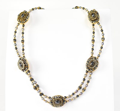 Lot 1124 - MICHAL GOLAN; a gold-coloured double-strand...