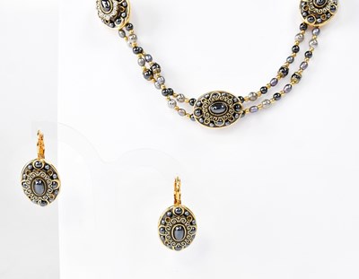 Lot 1124 - MICHAL GOLAN; a gold-coloured double-strand...