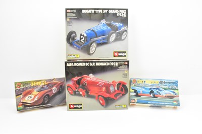 Lot 521 - Four automobile construction kits, including...
