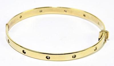 Lot 1286 - A 9ct yellow gold bracelet later set with ten...