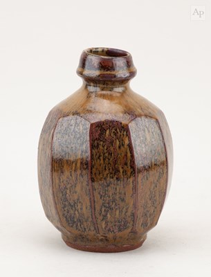 Lot 440 - MIKE DODD (born 1943); a faceted stoneware...