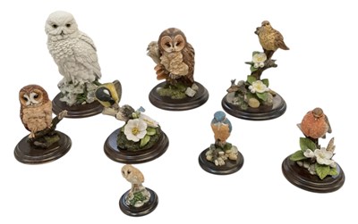 Lot 587 - COUNTRY ARTISTS; a collection of eight figures...