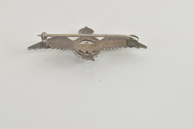 Lot 1329 - A 9ct white gold RAF sweetheart brooch, with...