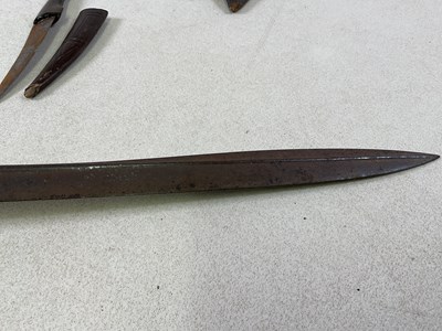 Lot 53 - A collection of various military swords and...