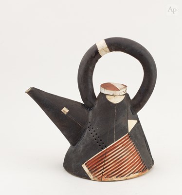 Lot 739 - An earthenware teapot with loop handle...