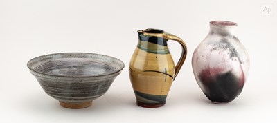 Lot 567 - RICHARD PHETHEAN (born 1953); a slipware jug,...