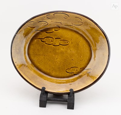Lot 139 - CLIVE BOWEN (born 1943); an oval slipware dish...