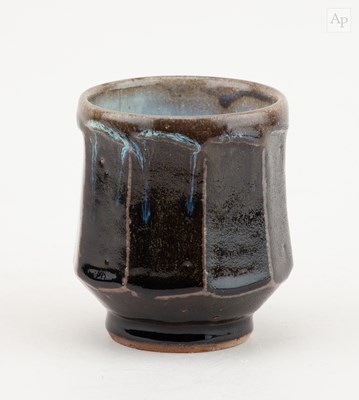 Lot 444 - MIKE DODD (born 1943); a faceted stoneware...