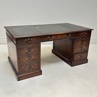 Lot 1101 - A large reproduction mahogany nine drawer...