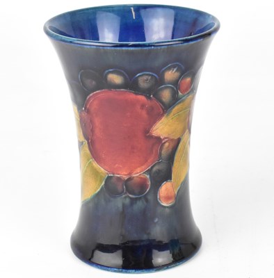 Lot 402 - MOORCROFT; a small tube-lined waisted vase,...