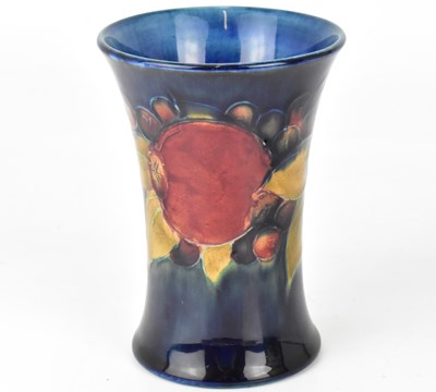 Lot 402 - MOORCROFT; a small tube-lined waisted vase,...