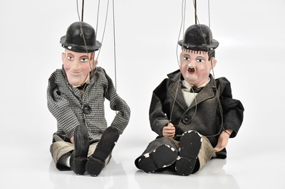 Lot 2091 - Two 1950s Laurel and Hardy puppets, overall...