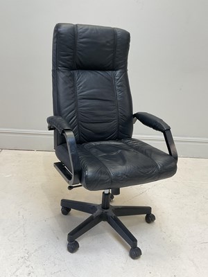 Lot 1039 - A modern leatherette swivel office chair.