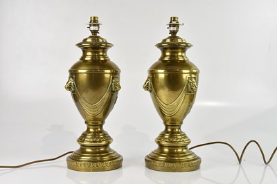 Lot 1693 - A pair of modern urn lamps decorated with...