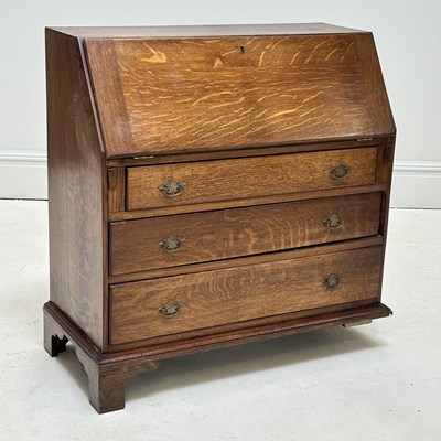 Lot 1088 - A 19th century oak bureau with fall front...
