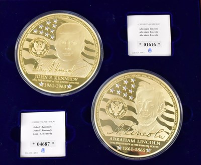 Lot 967 - Two large gold-plated commemorative coins,...