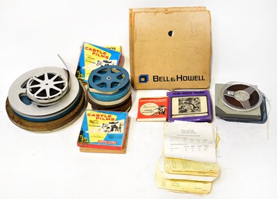 Lot 403 - A large collection of film reels comprising...
