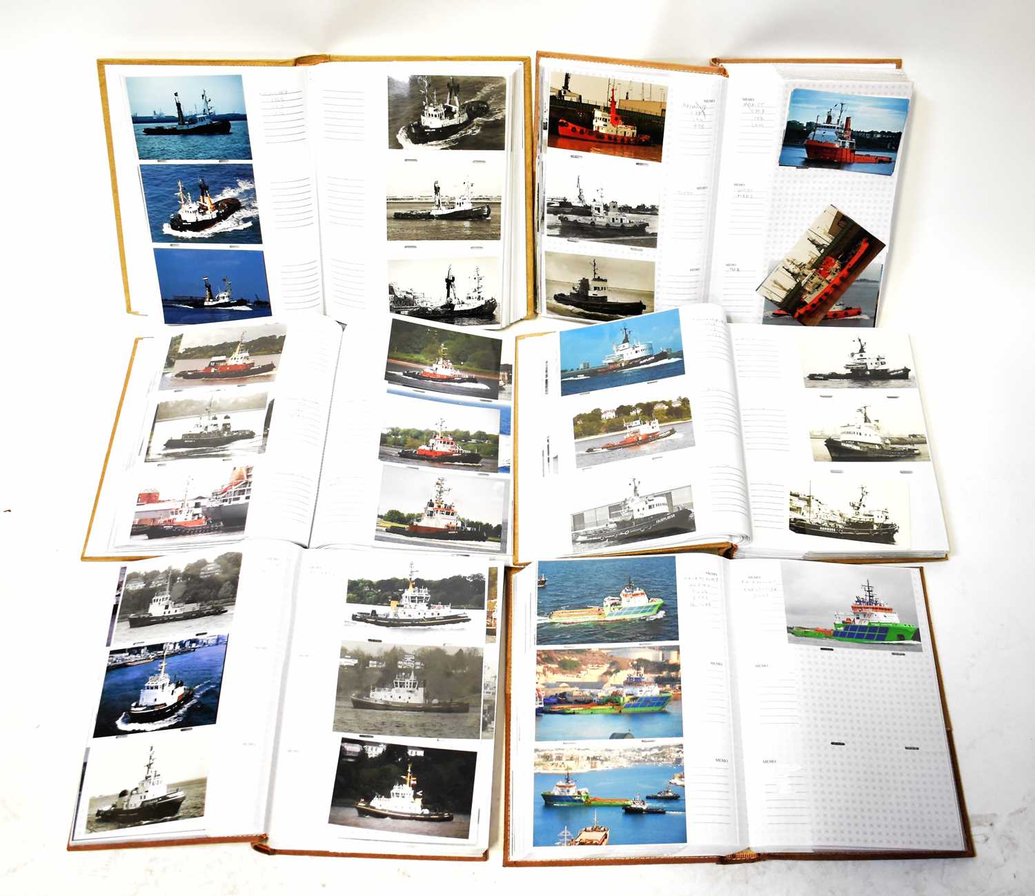 Lot 269 - Six albums of tugboat photographs from around...