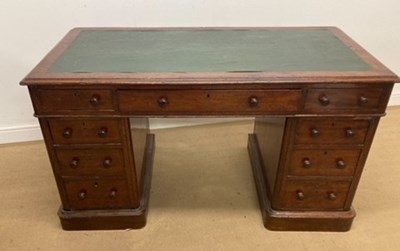 Lot 732 - A mahogany twin pedestal desk, the top having...
