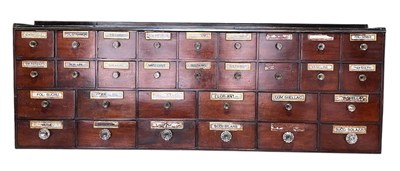 Lot 704 - A mahogany apothecary chest, the raised back...