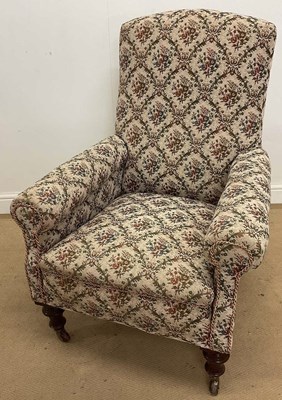 Lot 702 - A Victorian armchair, raised on ring turned...
