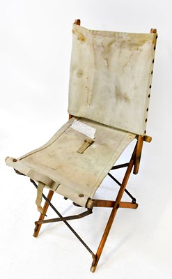 Lot 933 - A WWII era folding canvas chair.