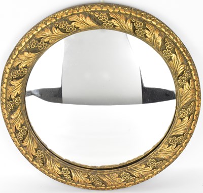 Lot 74 - A vintage circular wall mirror with gilt wood...