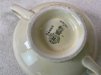 Lot 222 - ROYAL DOULTON; an Art Deco dinner service, in '...