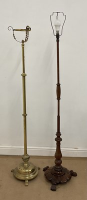 Lot 669 - A brass adjustable stand for an oil lamp...
