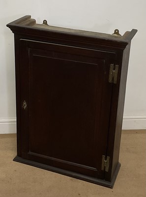 Lot 717 - A late 18th century oak flat fronted hanging...